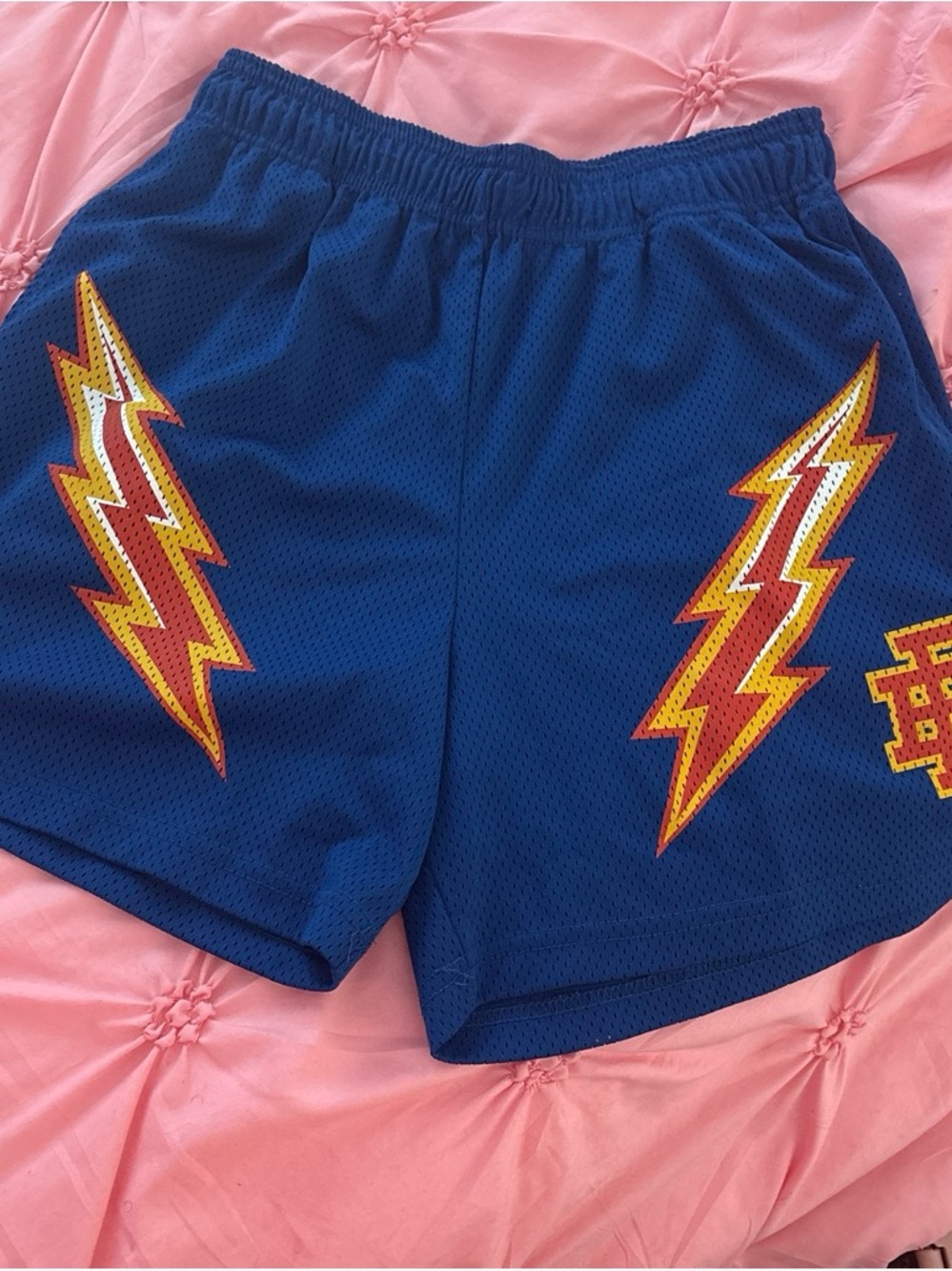 Eric Emanuel Blue Athletic Mesh Shorts with Red and Yellow Lightning